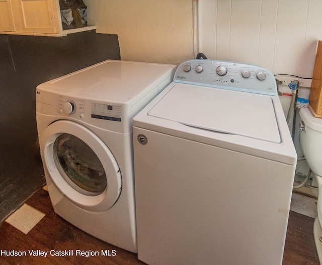 73 Cauterskill Ave, Catskill, NY 12414 - laundry room featuring washer and clothes dryer and wood finished floors