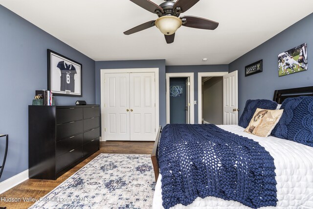1 Stoneridge Dr, Loudonville, NY 12211 - bedroom with dark wood-style flooring, a closet, and ceiling fan