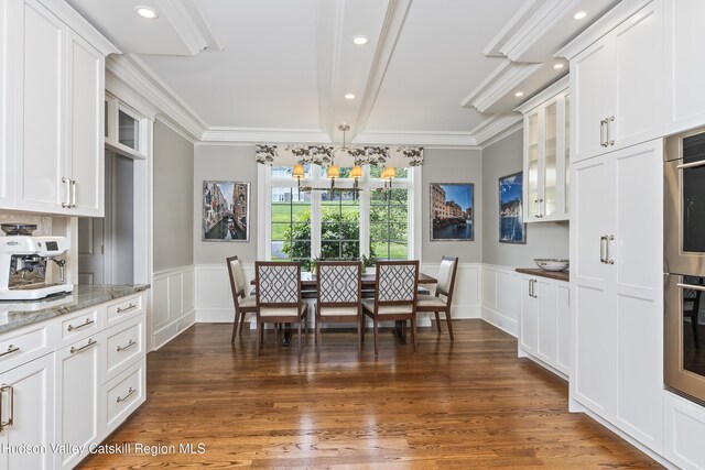 1 Stoneridge Dr, Loudonville, NY 12211 - dining room featuring a decorative wall, ornamental molding, a wainscoted wall, and dark wood-style floors