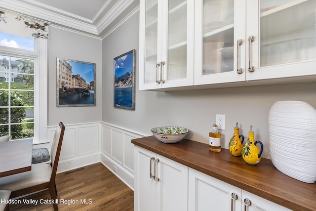 1 Stoneridge Dr, Loudonville, NY 12211 - detailed view of ornamental molding, wood finished floors, a wainscoted wall, and a decorative wall
