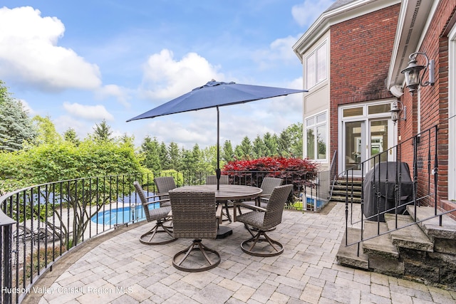 1 Stoneridge Dr, Loudonville, NY 12211 - view of patio / terrace with outdoor dining area, a grill, and entry steps