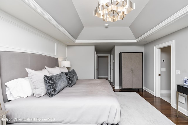 1 Stoneridge Dr, Loudonville, NY 12211 - bedroom featuring a raised ceiling, a chandelier, and dark wood-style floors