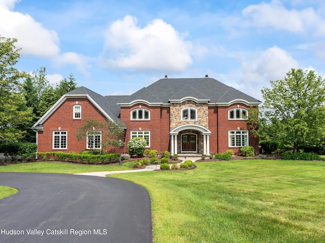 1 Stoneridge Dr, Loudonville, NY 12211 - view of front facade featuring a front lawn and brick siding