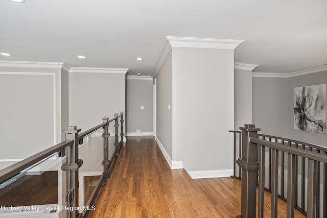 1 Stoneridge Dr, Loudonville, NY 12211 - hallway with an upstairs landing, ornamental molding, recessed lighting, and wood finished floors