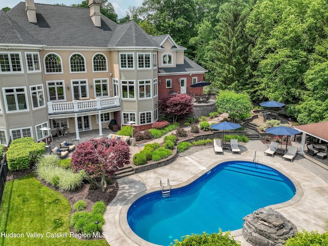 1 Stoneridge Dr, Loudonville, NY 12211 - swimming pool featuring a patio area and a wooden deck