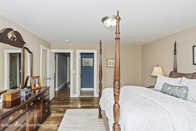 1 Stoneridge Dr, Loudonville, NY 12211 - bedroom with dark wood-style floors and baseboards
