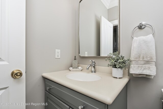 1 Stoneridge Dr, Loudonville, NY 12211 - bathroom featuring vanity and crown molding
