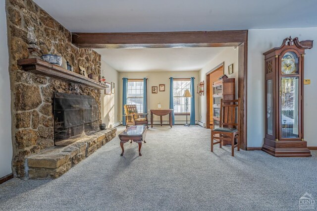 176 High Rock Rd, West Coxsackie, NY 12192 - carpeted living area featuring baseboards, beam ceiling, and a stone fireplace