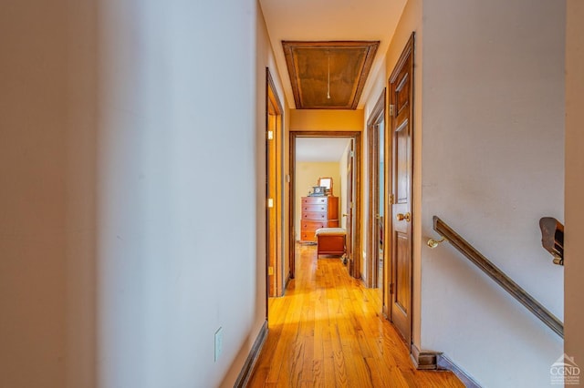 176 High Rock Rd, West Coxsackie, NY 12192 - hall featuring attic access, light wood-style floors, and an upstairs landing