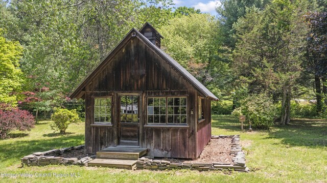 202 Buckwheat Bridge Rd, Germantown, NY 12526 - view of outdoor structure featuring a view of trees