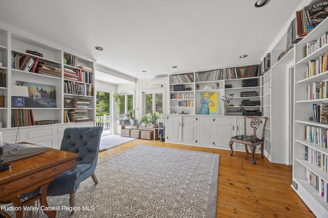 202 Buckwheat Bridge Rd, Germantown, NY 12526 - home office with wood-type flooring and built in shelves