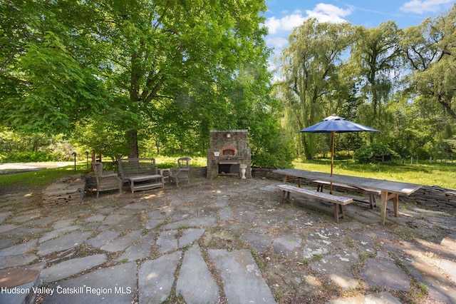 202 Buckwheat Bridge Rd, Germantown, NY 12526 - view of patio featuring an outdoor stone fireplace