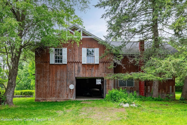 202 Buckwheat Bridge Rd, Germantown, NY 12526 - rear view of house featuring a lawn and a chimney