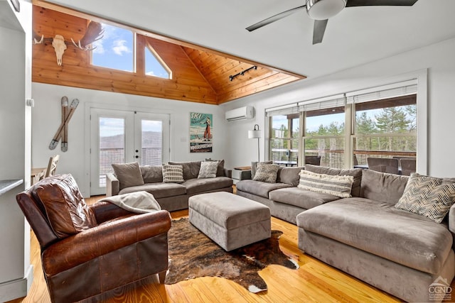 562 New Concord Rd, Chatham, NY 12060 - living room featuring vaulted ceiling, a wall unit AC, healthy amount of natural light, a ceiling fan, and wooden ceiling