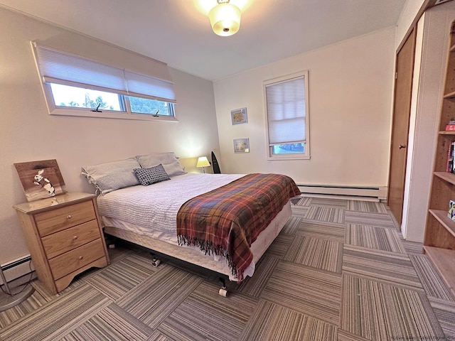 603-607 Wittenberg Rd, Mount Tremper, NY 12457 - carpeted bedroom with a baseboard radiator