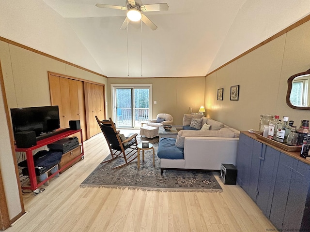 living room featuring ceiling fan, high vaulted ceiling, and light hardwood / wood-style floors