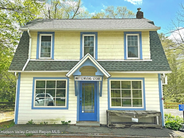 603-607 Wittenberg Rd, Mount Tremper, NY 12457 - view of front facade featuring a chimney and a shingled roof