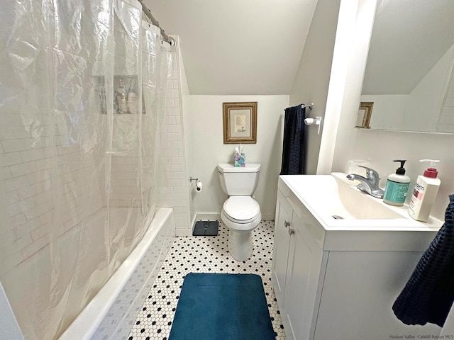 603-607 Wittenberg Rd, Mount Tremper, NY 12457 - bathroom with vaulted ceiling, toilet, vanity, shower / bathtub combination with curtain, and tile patterned floors