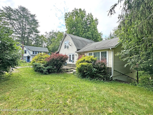 exterior space with a front lawn