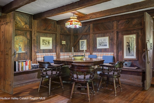 1716 Rte 212, Saugerties, NY 12477 - dining area with wooden walls, beam ceiling, and hardwood / wood-style flooring