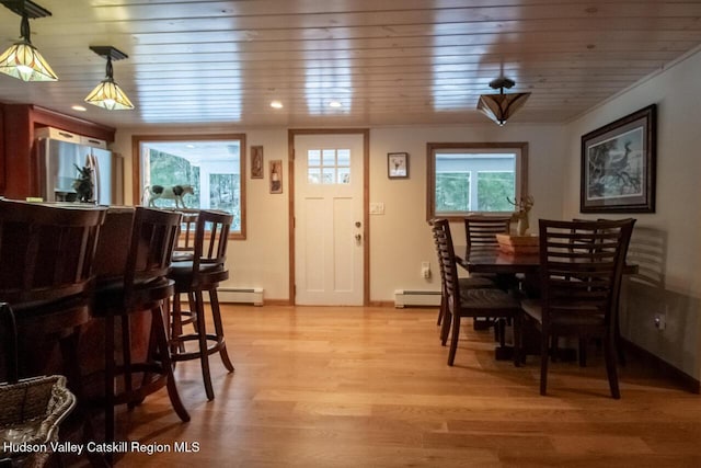 50 Tempaloni Rd, Ellenville, NY 12428 - dining area with a baseboard radiator, light wood-style floors, wooden ceiling, recessed lighting, and baseboards