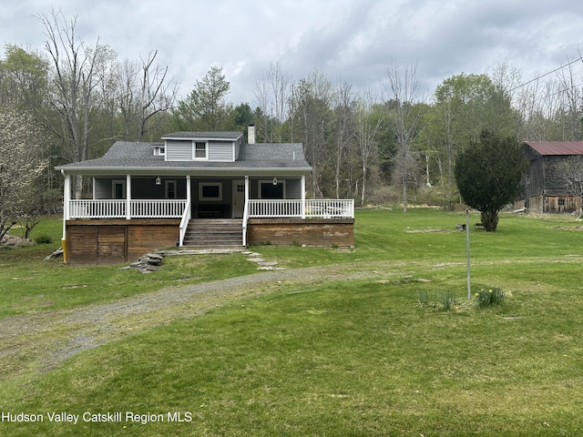 50 Tempaloni Rd, Ellenville, NY 12428 - view of front facade with a chimney, a front lawn, a porch, and roof with shingles