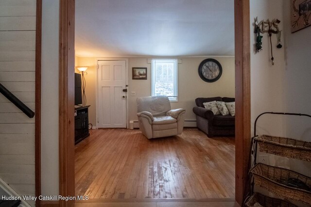 50 Tempaloni Rd, Ellenville, NY 12428 - living area with hardwood / wood-style floors, a baseboard heating unit, and a baseboard radiator