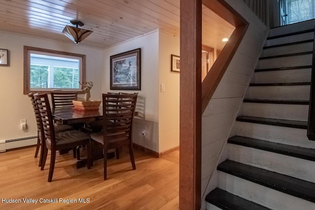 50 Tempaloni Rd, Ellenville, NY 12428 - dining room with stairway, light wood finished floors, baseboards, baseboard heating, and wooden ceiling
