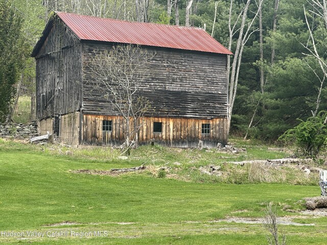 50 Tempaloni Rd, Ellenville, NY 12428 - view of barn featuring a lawn