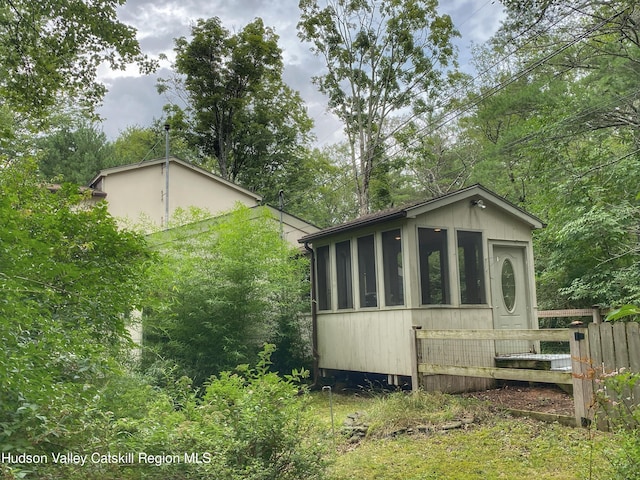 exterior space with a sunroom