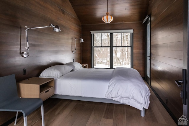 890 Bald Mountain Rd, Austerlitz, NY 12017 - bedroom featuring wooden walls, lofted ceiling, dark wood finished floors, and wooden ceiling