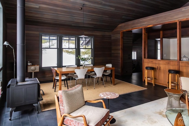 890 Bald Mountain Rd, Austerlitz, NY 12017 - living room featuring a wood stove, wood walls, vaulted ceiling, wood ceiling, and wood finished floors