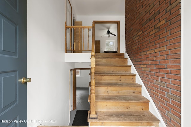146 Sherman Rd, Kingston, NY 12401 - stairs featuring a ceiling fan and brick wall