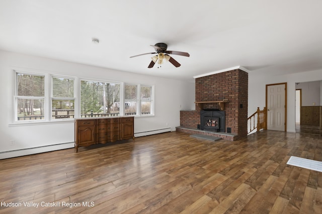 146 Sherman Rd, Kingston, NY 12401 - unfurnished living room with ceiling fan, a baseboard heating unit, and wood finished floors