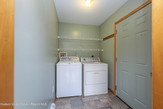 washroom featuring washer and clothes dryer