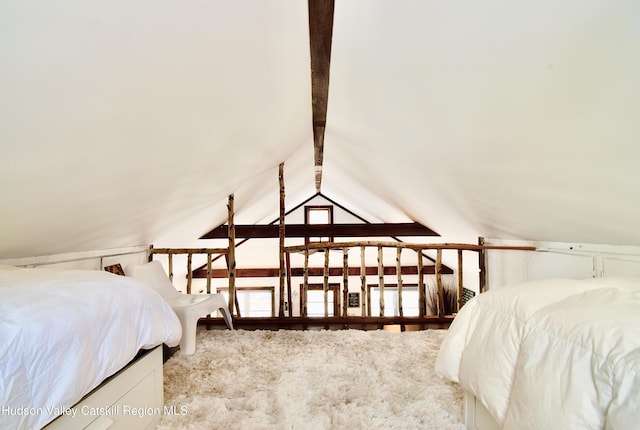 bedroom featuring lofted ceiling