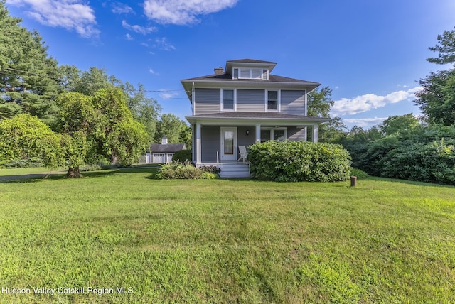 280 Pitcher Ln, Red Hook, NY 12571 - traditional style home featuring a porch, a front lawn, and a chimney