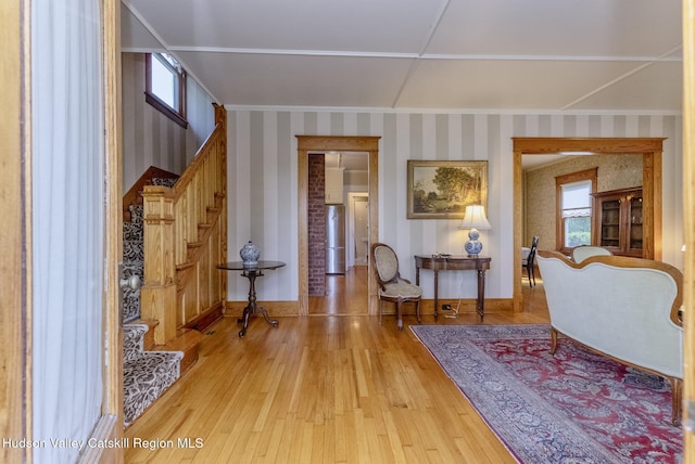 280 Pitcher Ln, Red Hook, NY 12571 - foyer entrance featuring wallpapered walls, stairway, hardwood / wood-style floors, and crown molding