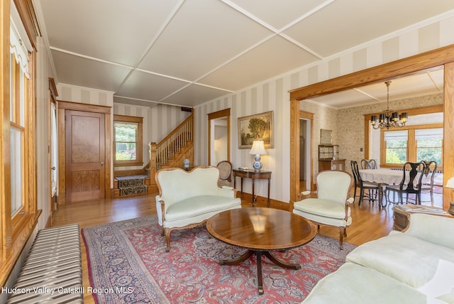 280 Pitcher Ln, Red Hook, NY 12571 - living room with wallpapered walls, wood finished floors, plenty of natural light, and a chandelier