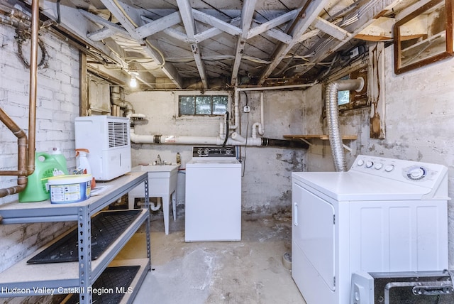 280 Pitcher Ln, Red Hook, NY 12571 - unfinished basement featuring washing machine and clothes dryer and a sink