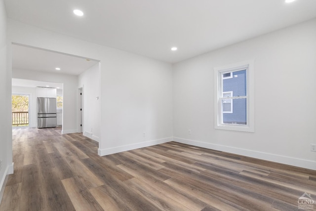 143 Grand St, Schoharie, NY 12157 - empty room with dark wood-style floors, baseboards, and recessed lighting