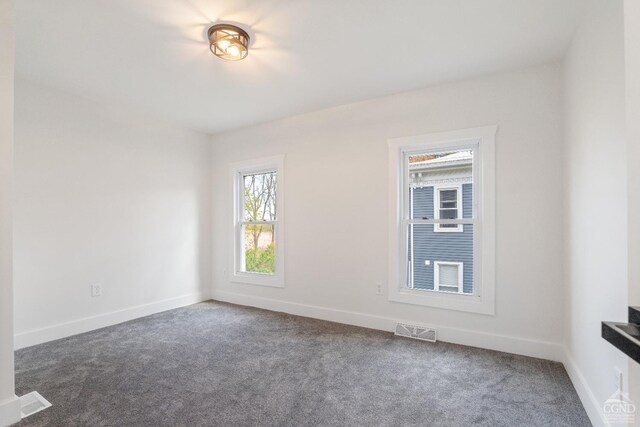 143 Grand St, Schoharie, NY 12157 - carpeted empty room with baseboards