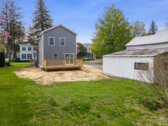 143 Grand St, Schoharie, NY 12157 - rear view of property featuring a deck and a lawn
