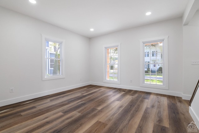 143 Grand St, Schoharie, NY 12157 - unfurnished room featuring plenty of natural light, dark wood-style floors, recessed lighting, and baseboards