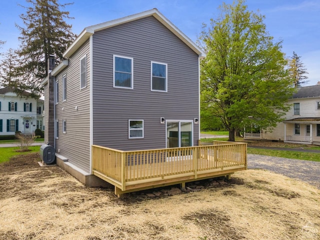 143 Grand St, Schoharie, NY 12157 - rear view of house with a wooden deck and heating fuel