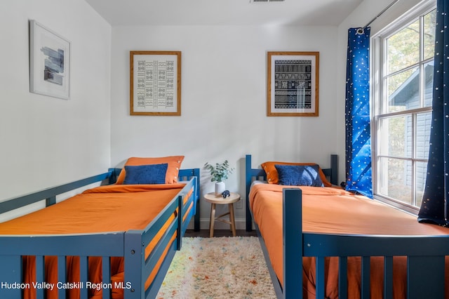 bedroom featuring hardwood / wood-style flooring