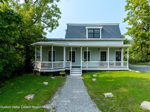 view of front of home with a front yard