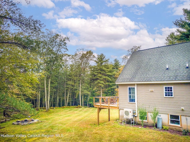 view of yard featuring a wooden deck