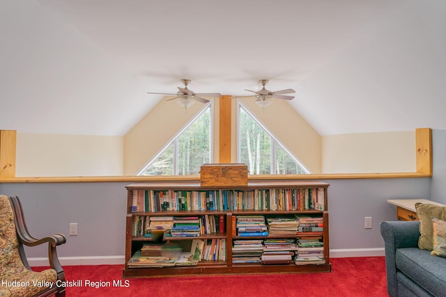 living area with carpet, ceiling fan, and lofted ceiling