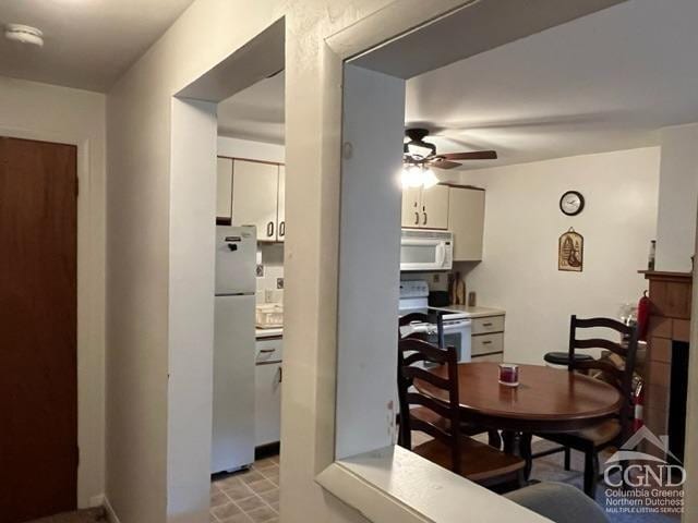 75 Highlands Dr Unit T-4, Hunter, NY 12442 - dining room with ceiling fan